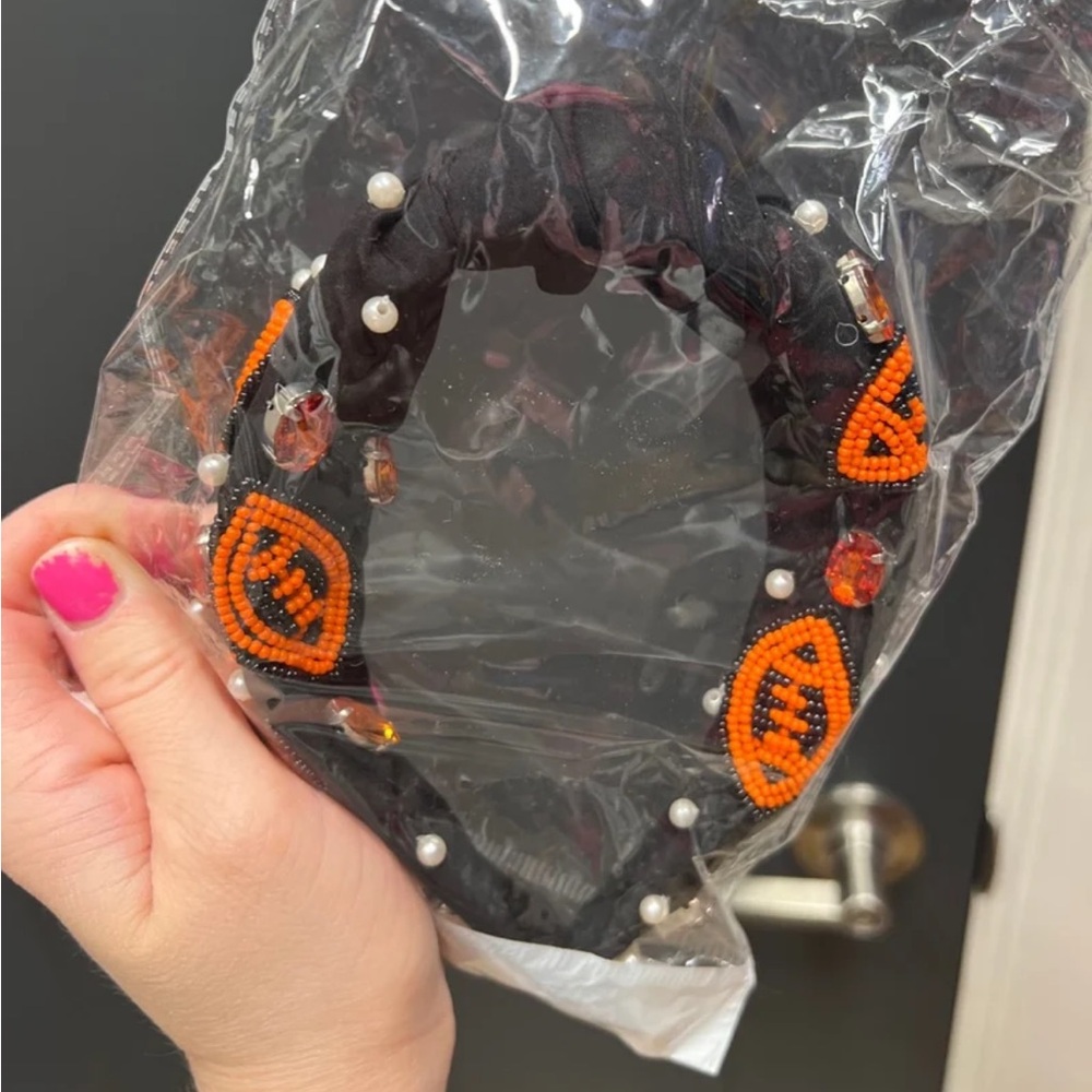 Orange and black NWT Avara football headband